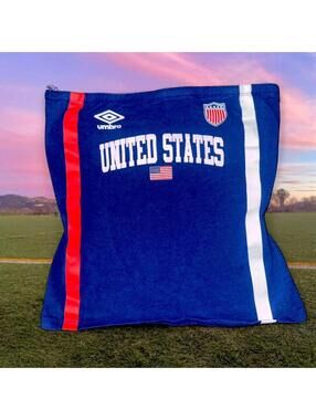 Blue Umbro tube top featuring bold “UNITED STATES” lettering,